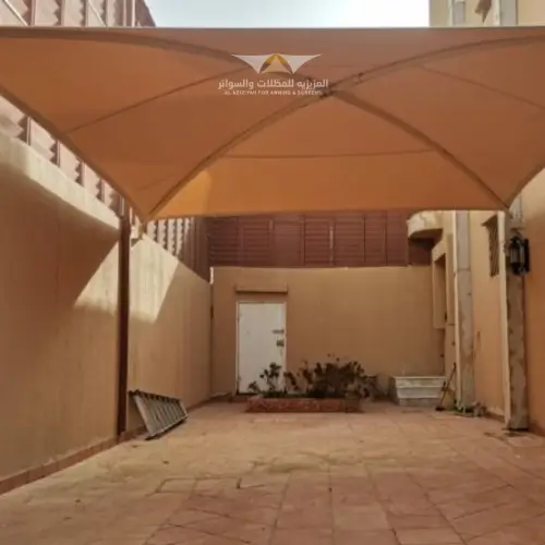 مظلات الشد الإنشائي (تصاميم هندسية)